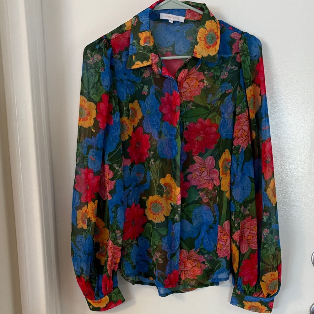 Brand of OLIVCEUS. Floral red and blu and green and  yelow. Size M